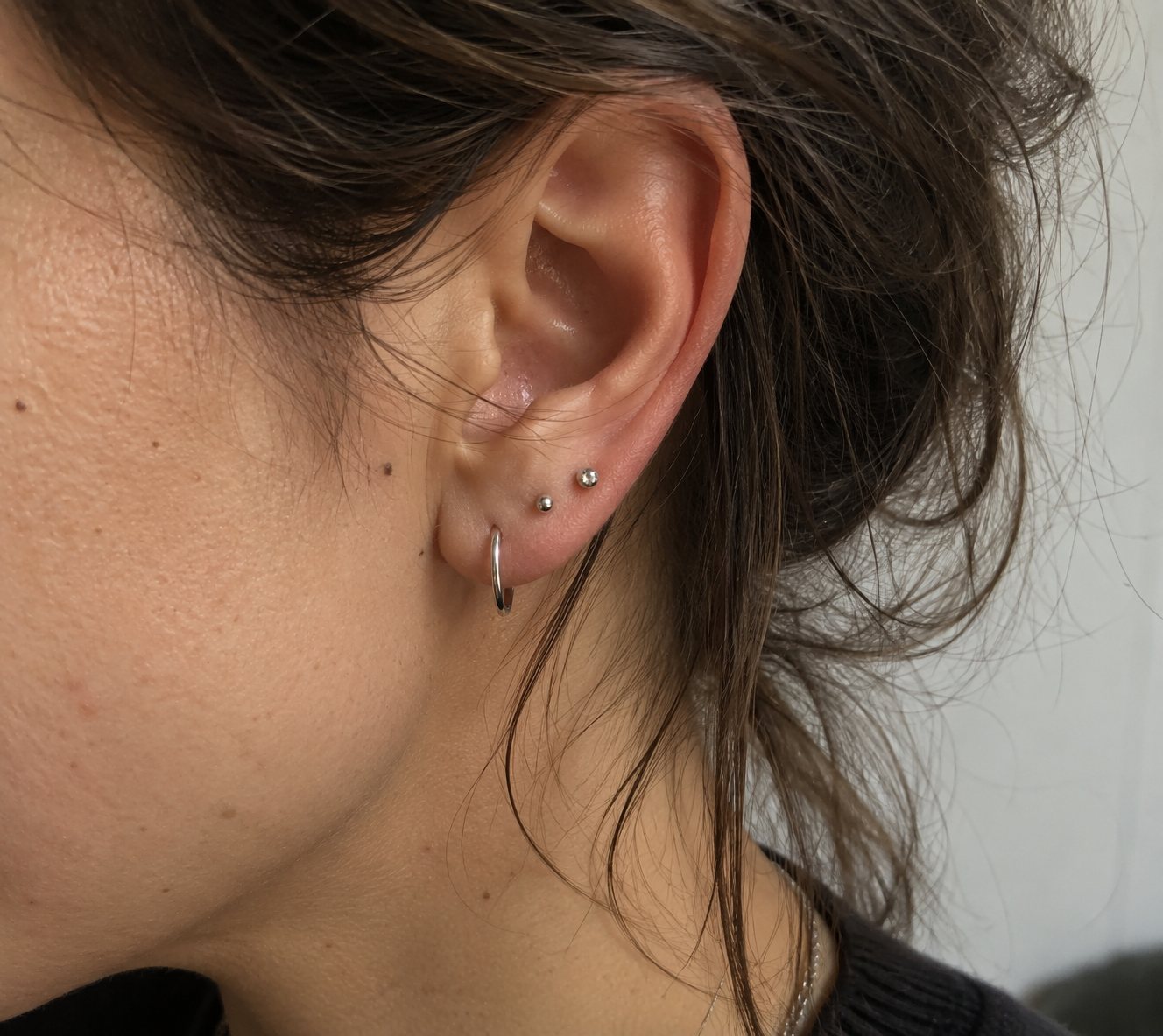 Illustrative ear piercing jewelry detail